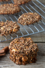 Homemade cookie with oat flakes, nuts and quinoa. Wholegrain cookies. healthy snack or dessert.
