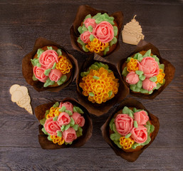 Naklejka na ściany i meble Cupcakes with buttercream flowers