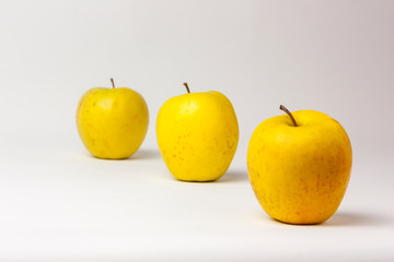 Yellow apples isolated on white background