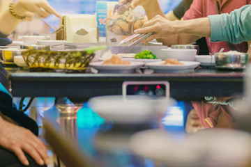 Happiness Enjoy eating Korean BBQ traditional famous food with family in a Korean restaurant