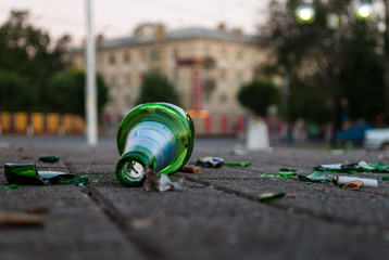 Broken beer bottle the morning after a public holiday