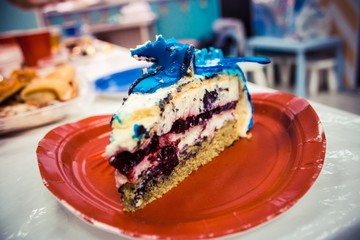 a piece of delicious cake lies on a plate at the feast