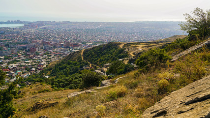 View of the south-eastern part of the city of Makhachkala - the capital of the Republic of Dagestan. On the left you can see the lake Ak-Gol, in the foreground - Leninsky district of the city