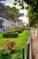 Historic houses with front garden on the beach promenade in Binz. Summer city on the Baltic Sea coast. Rügen is a popular tourist destination. Germany