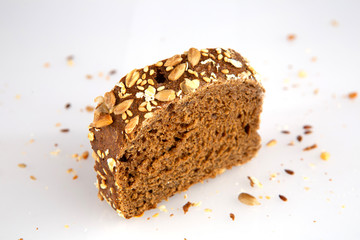 Swedish bread with sunflower and sesame seeds isolated on white background
