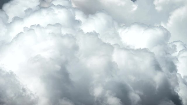 Big white fluffy clouds time lapse. UHD 4K