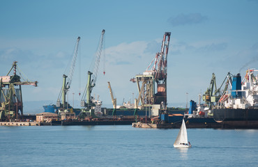 Industrial shipping cranes in the port of Taranto, Italy, Puglia