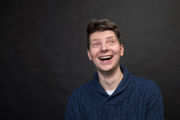 Handsome man on gray background