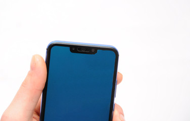 smartphone with a blue screen in hand