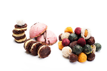 Raw useful vegan candy on a white background. Isolated objects. Place for text. Homemade diet sweets