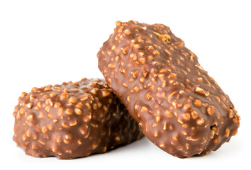 Chocolates with nuts on a white background. Isolated.