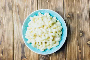 Mac and cheese, american style macaroni pasta with cheesy sauce