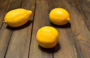 lemons on on a wooden background