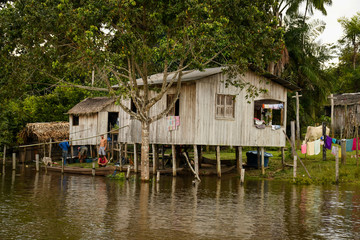 Fototapeta na wymiar simple dweller house by the river