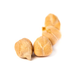 Dry raw organic chickpeas isolated on white background