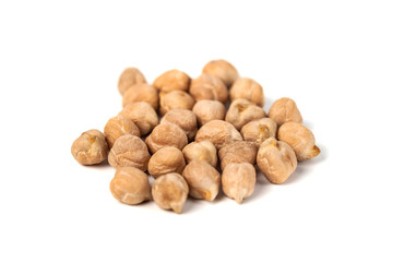 Dry raw organic chickpeas isolated on white background