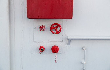 In case of fire, bulkhead equip with water hose and connections for fighting a fire on ship