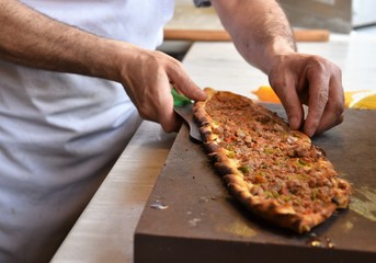 A type of flatbread Turkish pide is being served