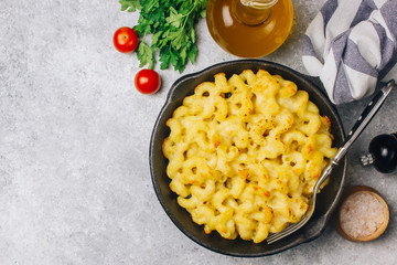 Mac and cheese, american style macaroni pasta with cheesy sauce