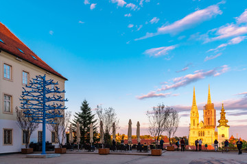 View of Zagreb cathedral and of St. Mary church from upper town at sunset, Croatia