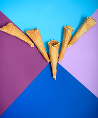 Waffle cone on colored geometric shapes