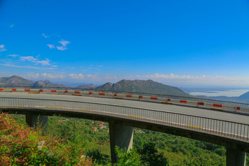 high bridge overlooking the mountains and the bay