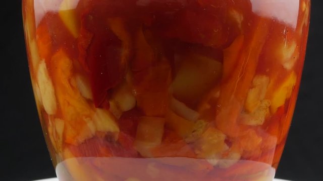 Canned vegetable lecho in a glass jar