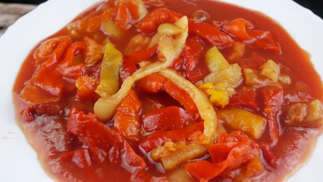 Canned vegetable lecho on the plate