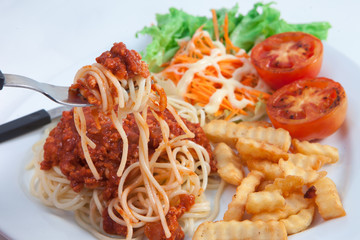 Spaghetti with sauce and salad and Fenfried