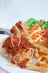 Spaghetti with sauce and salad and Fenfried