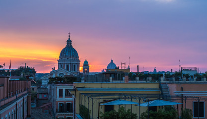 Sunset hour in Rome, Italy with cityscapes and rooftop views
