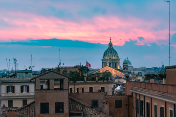 Fototapeta na wymiar Sunset hour in Rome, Italy with cityscapes and rooftop views