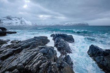 Norwegian Sea waves on rocky coast of Lofoten islands, Norway