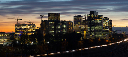Sunset cityscape of Zuidas the business and commercial  zone of Amsterdam.