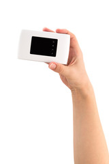 Portable usb router on a white background. 4g router in hand on a white background.