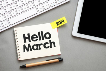 Hello march text in a notebook.