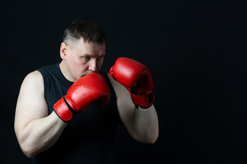 young man with boxing gloves