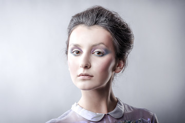portrait of stylish young woman with day makeup.