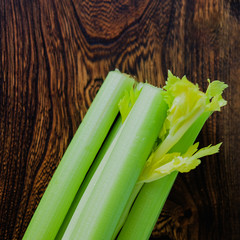 Celery stalk on wooden cutting board, Healthy vegan diet