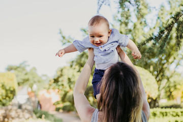 mother and son playing happy