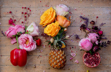 Pepper, pineapple and Pomegranate with roses decorated