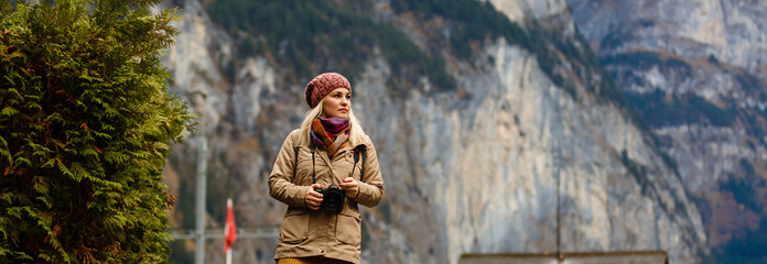 girl on a rural road in switzerland near the mountain jungfrau