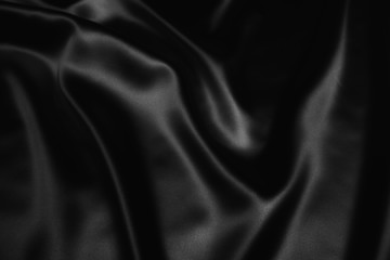 black abstract background luxury cloth or liquid wave or wavy folds of grunge silk texture satin velvet material or luxurious Christmas background or elegant wallpaper design, background