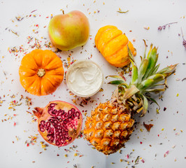 Skincare cream in a jar with Pomegranate; apple; pineapple, pumpkin