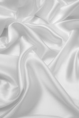 white abstract background luxury cloth or liquid wave or wavy folds of grunge silk texture satin velvet material or luxurious Christmas background or elegant wallpaper design, background