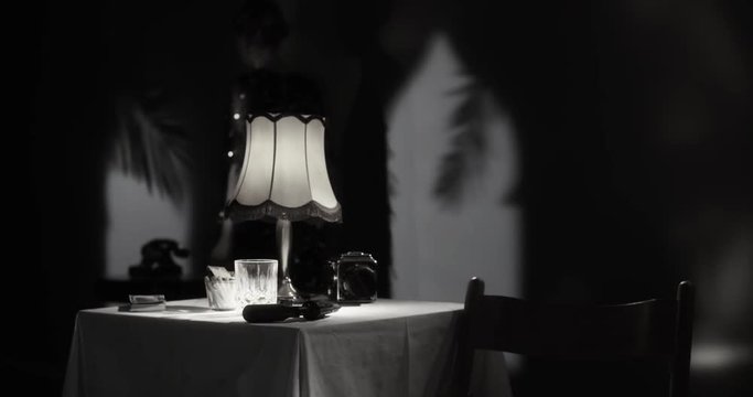 Beautiful woman answering a phone call in her hotel room