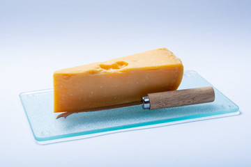 One piece of traditional Dutch very old hard cheese made from cow milk