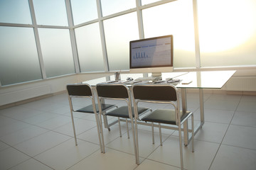 work Desk in a spacious conference room .