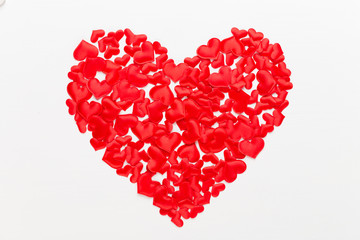 Fototapeta na wymiar Valentines day background red hearts on white wooden background.
