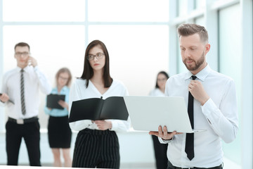 professional business team standing in the office lobby